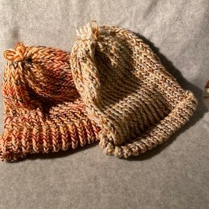 2 lightweight knitted caps, tan colored small & medium colored peach